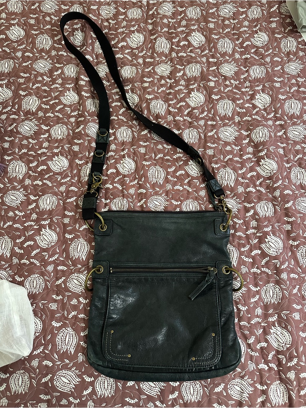 The Sak Black Leather Crossbody Bag with Brass Accents